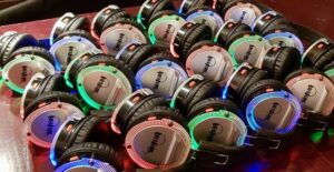 photo of silent disco headphones with multi colours