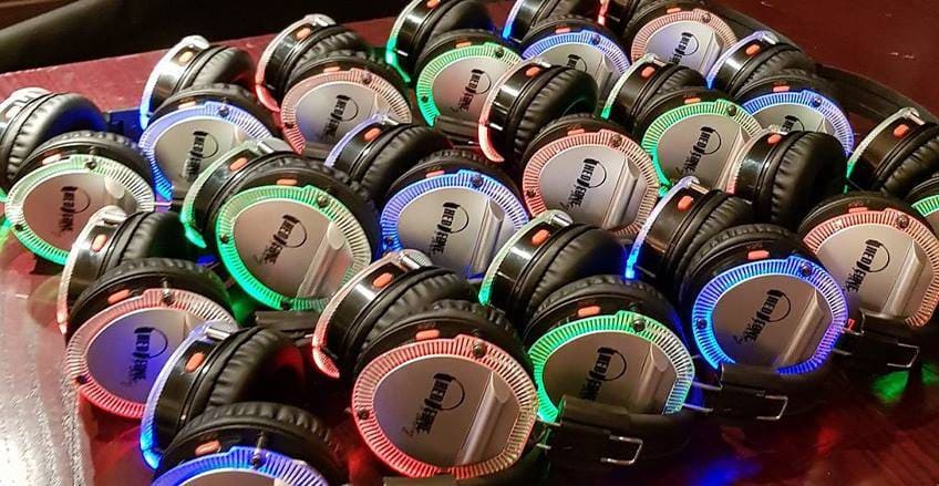 photo of silent disco headphones with multi colours