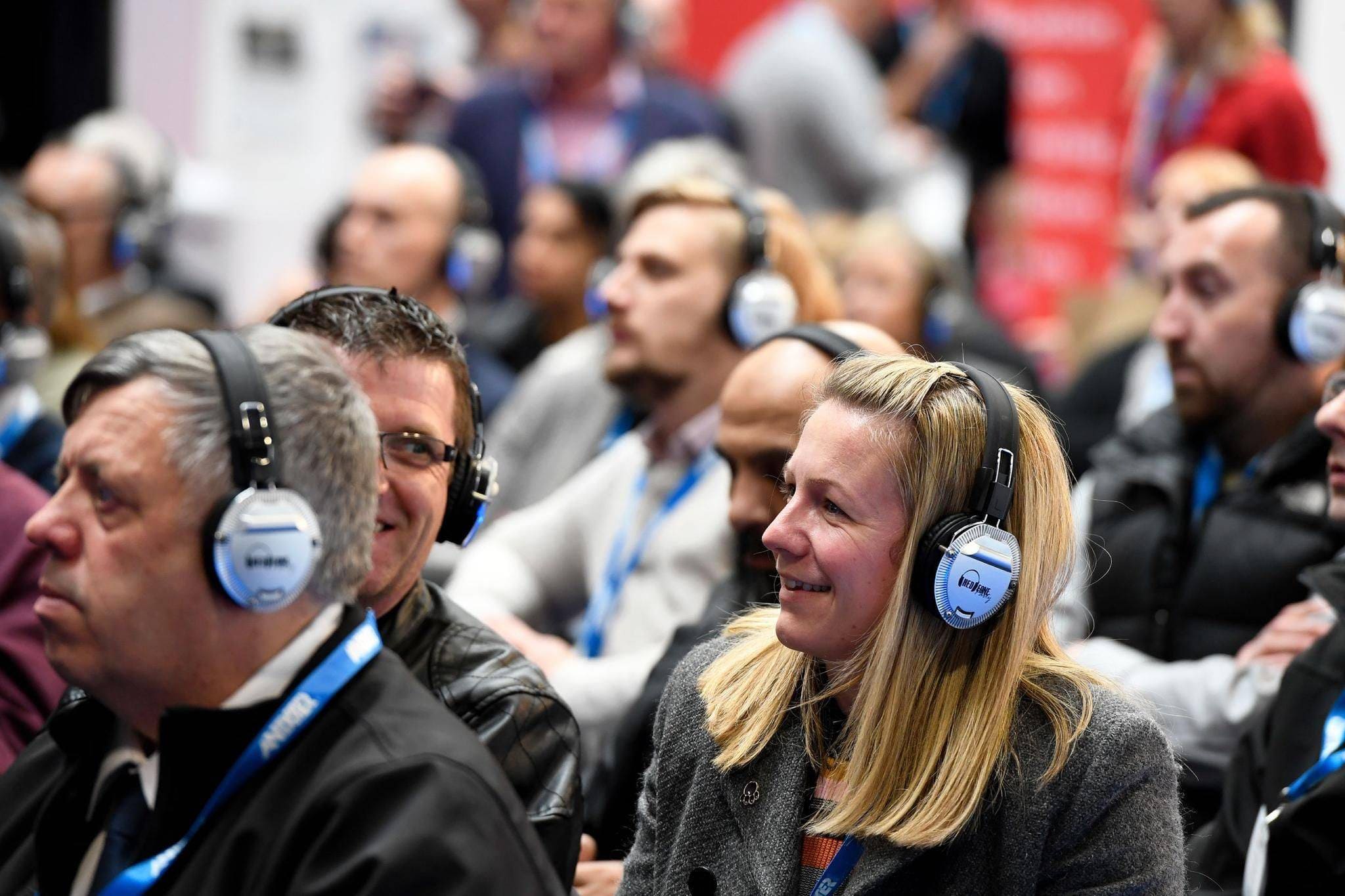 wireless headphones used at a conference