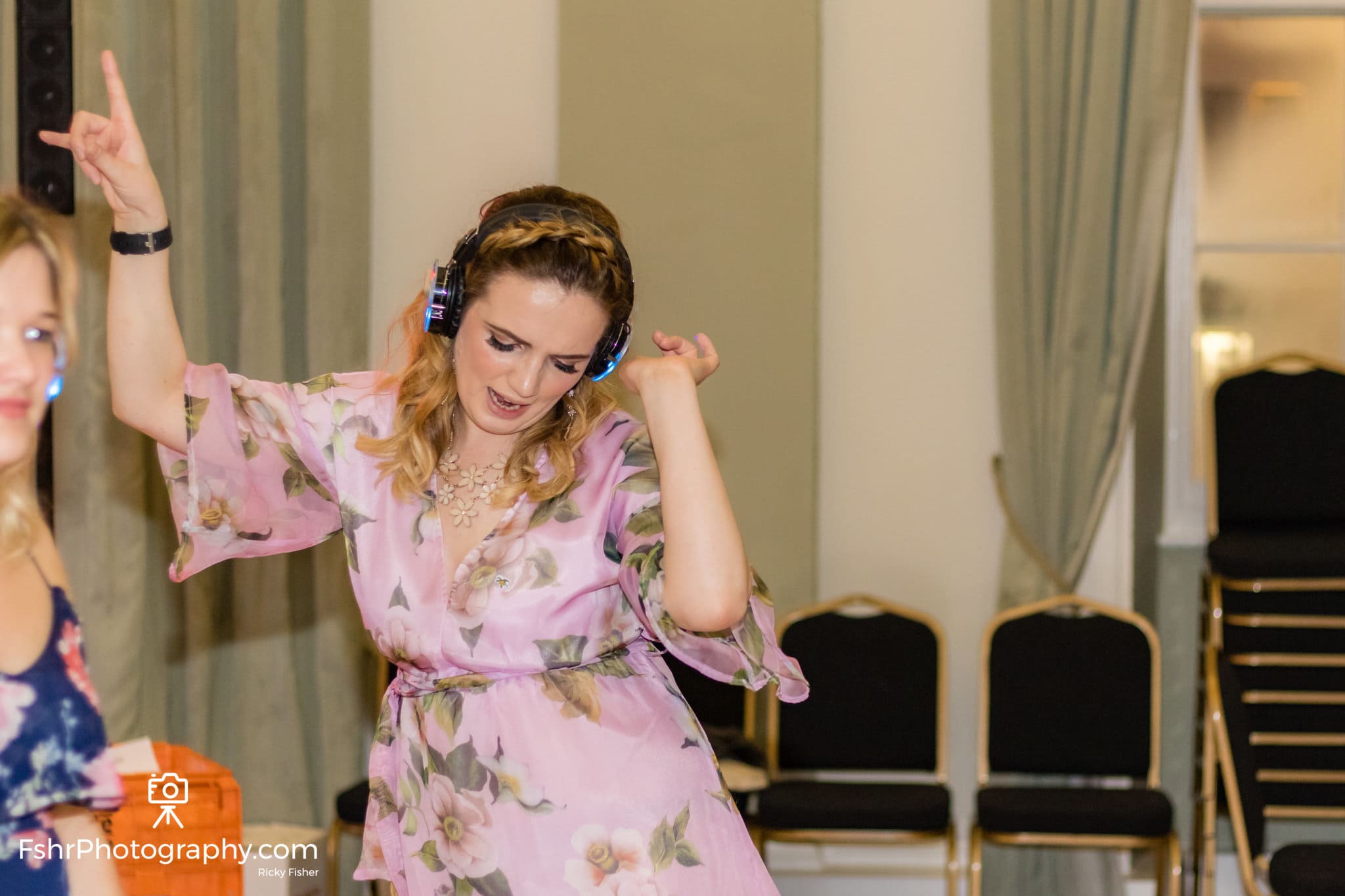 girl having fun at a silent disco wedding