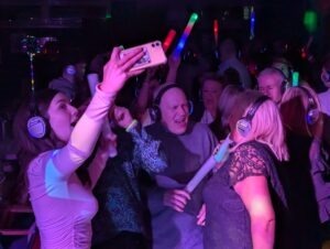 family enjoying their silent disco
